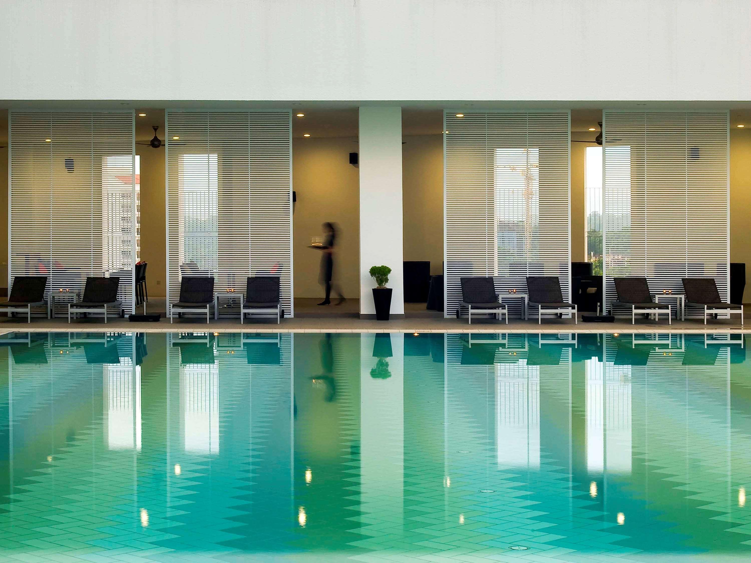 فندق بولمان كوشنغ كوشنج المظهر الخارجي الصورة The swimming pool at the hotel